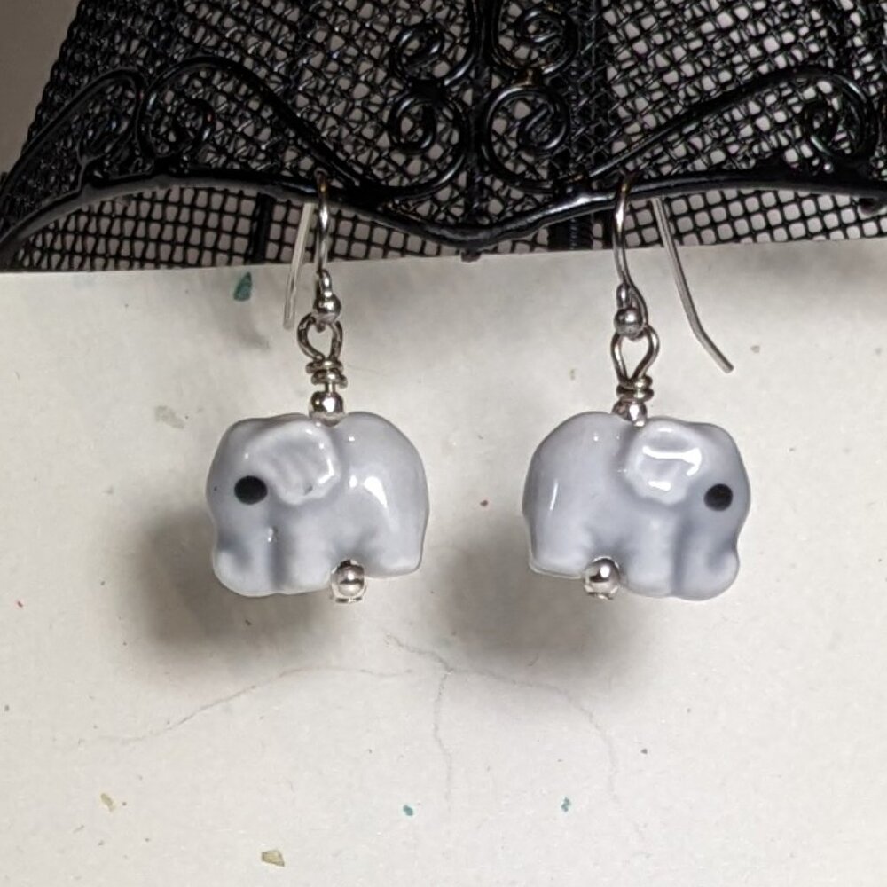 Hand-made ceramic grey elephants on stainless steel ear wires. New!